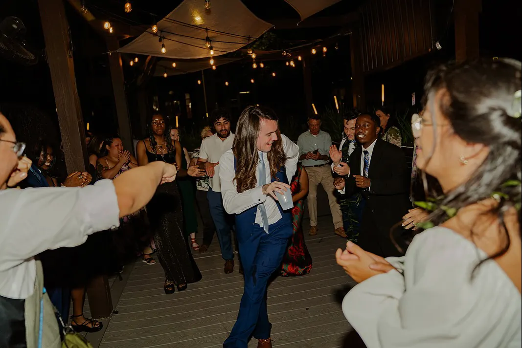 A guest dancing in the middle of the floor